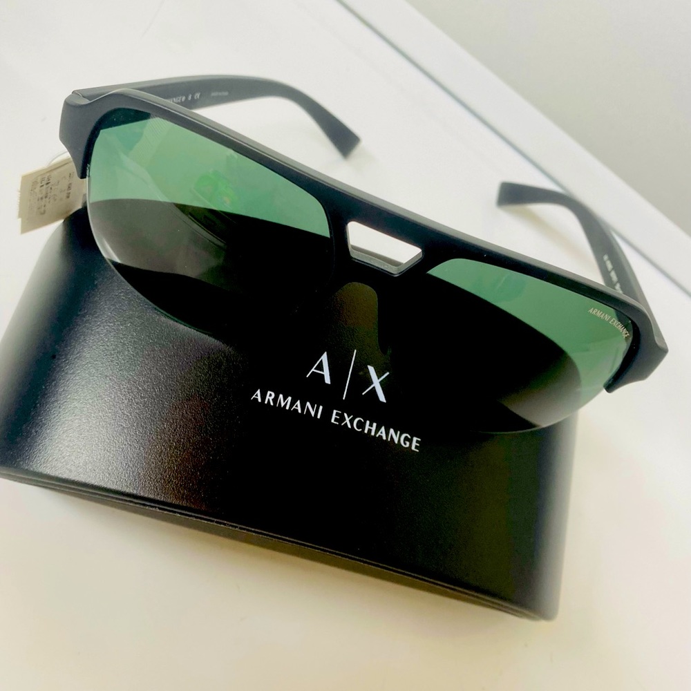 Brand new Armani men’s sunglasses new with tags on them asking 60$ for them